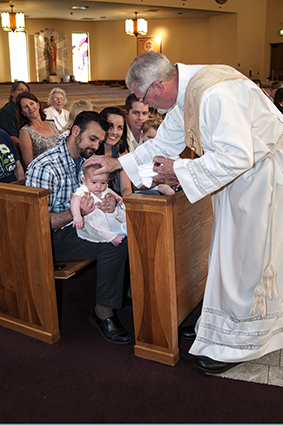 Anointing Michael wih oil